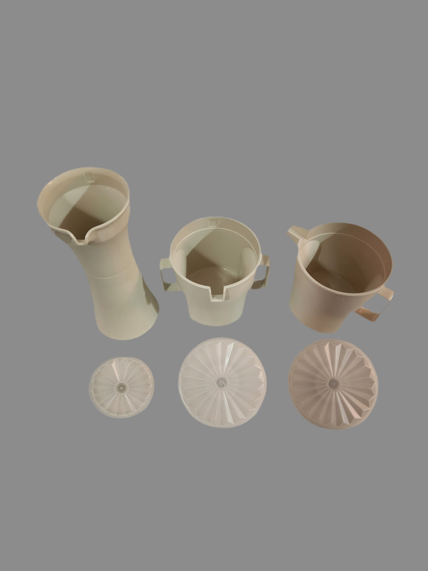 Tupperware creamer, sugar, vinegar,oil,or salad dressing dressing