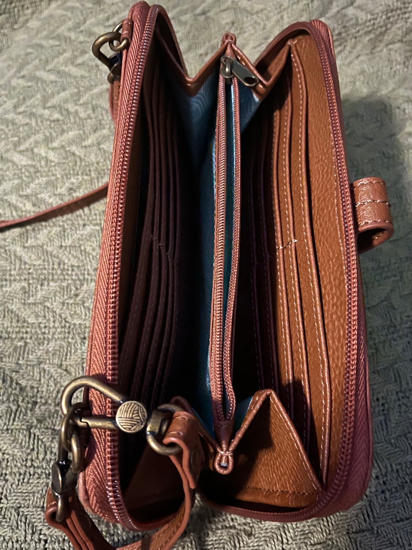 The Sak brown leather phone handbag