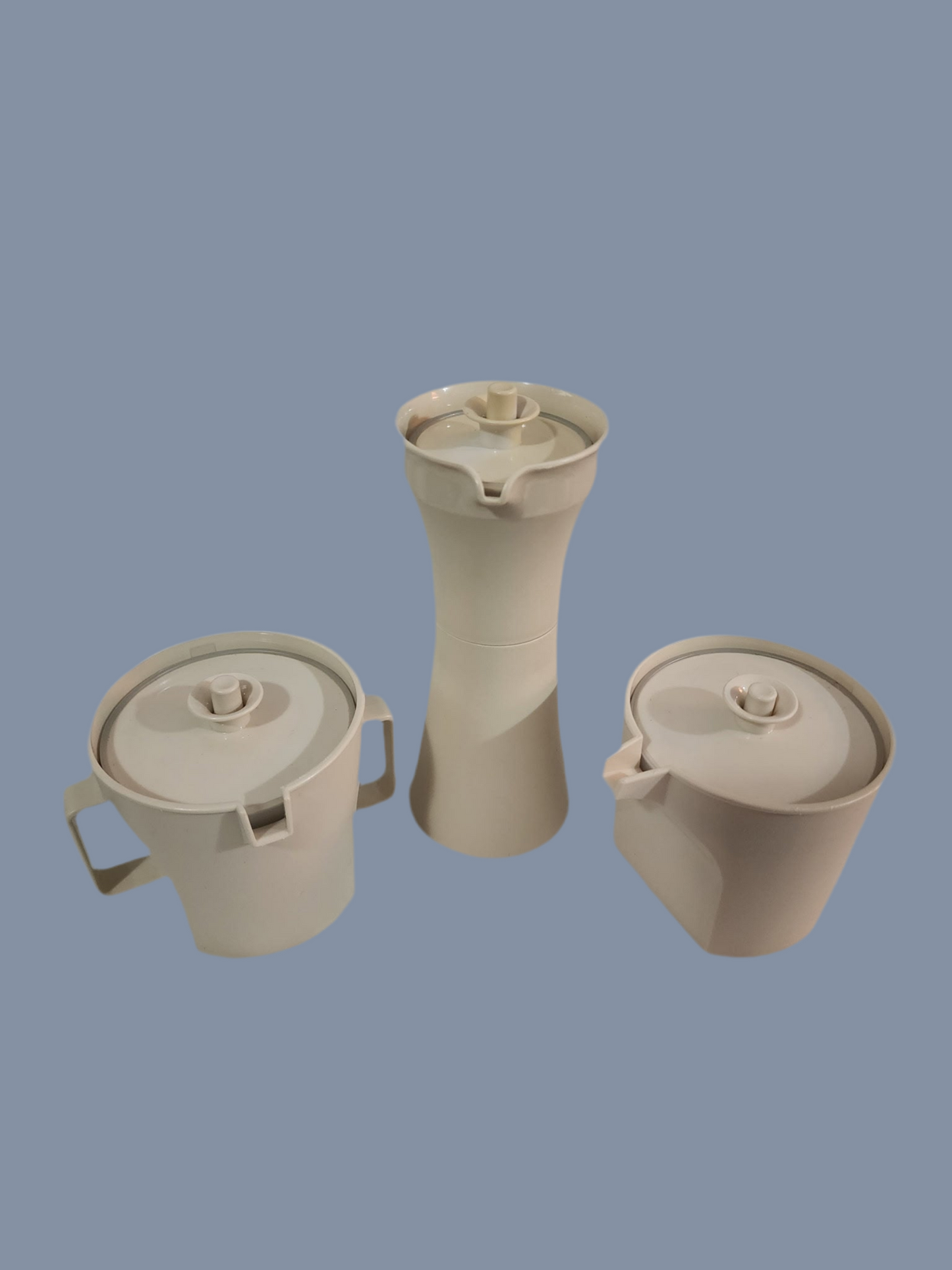 Tupperware creamer, sugar, vinegar,oil,or salad dressing dressing