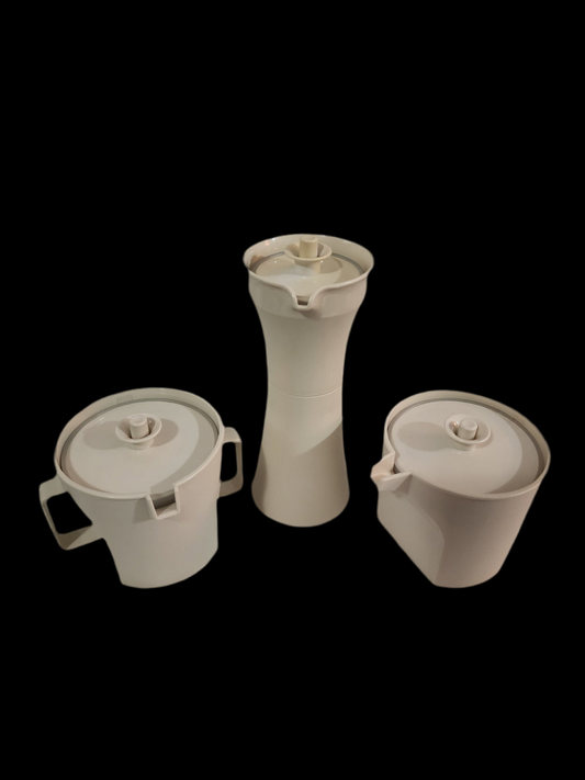 Tupperware creamer, sugar, vinegar,oil,or salad dressing dressing